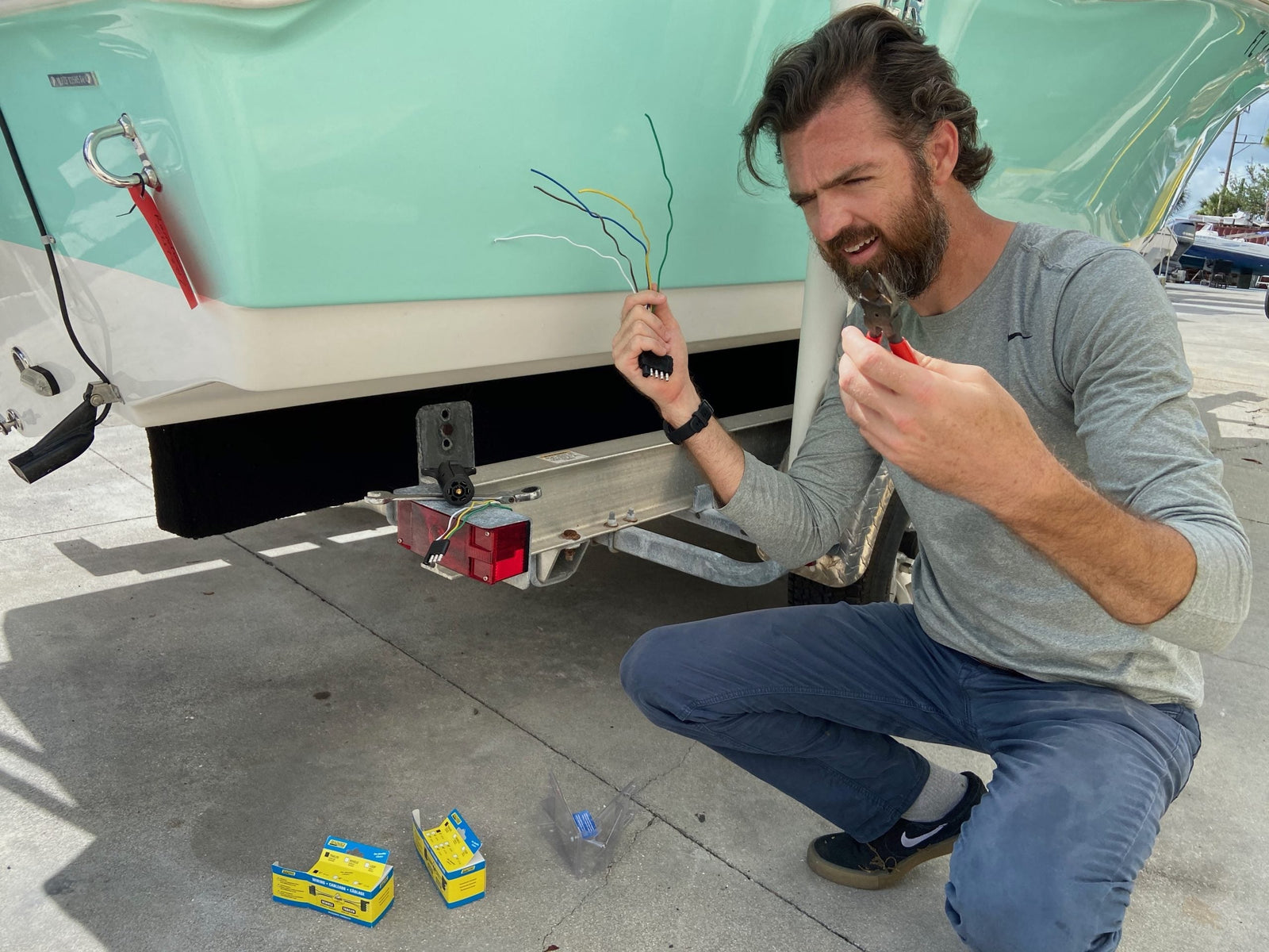 Boat trailer wiring harness with colored cables and connectors for safe and efficient electrical connections