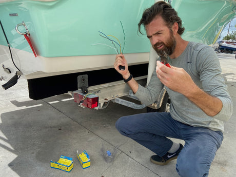 Boat trailer wiring harness with colored cables and connectors for safe and efficient electrical connections